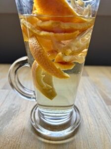 Just a glass filled with oranges