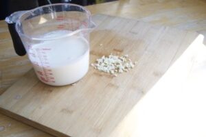Chopped garlic for creamy sauce Cheesy Potato Bake