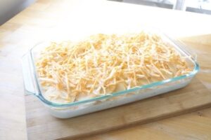 Final picture before baking the potato dish with grated cheese
