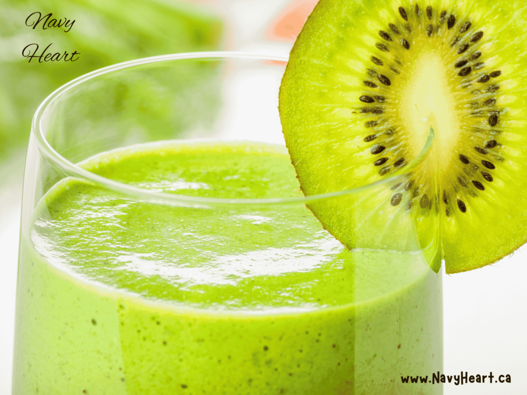 Glass of green smoothie with Kiwi