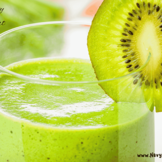 Glass of green smoothie with Kiwi